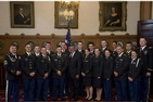Sam Stowers, SIS/MA '13 (third from left) and the 2013 Commissioning Class with Secretary of Defense Leon Panetta.